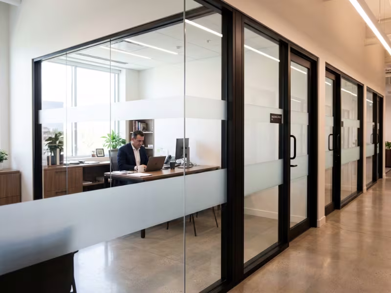 Private glass office with frosted privacy band Private glass office with frosted privacy band